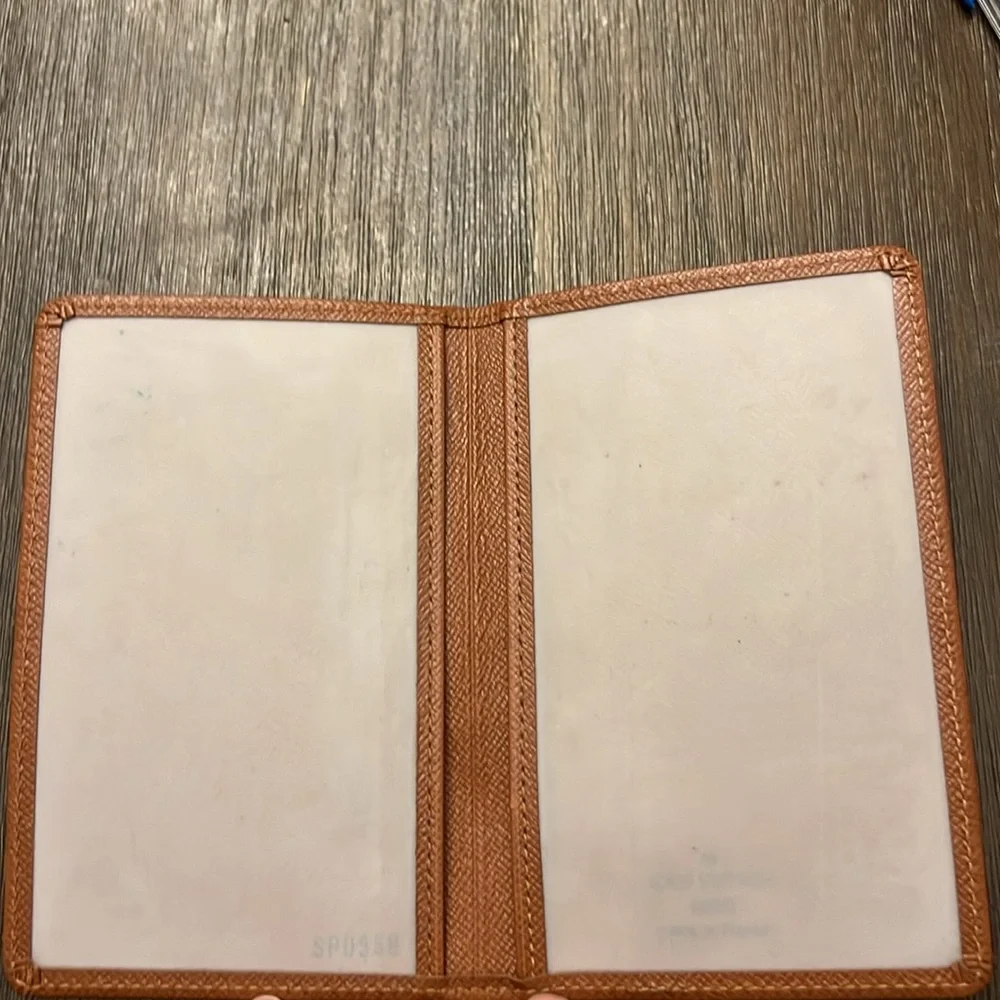 Authentic Louis Vuitton brown taiga leather bifold card I.D. Holder